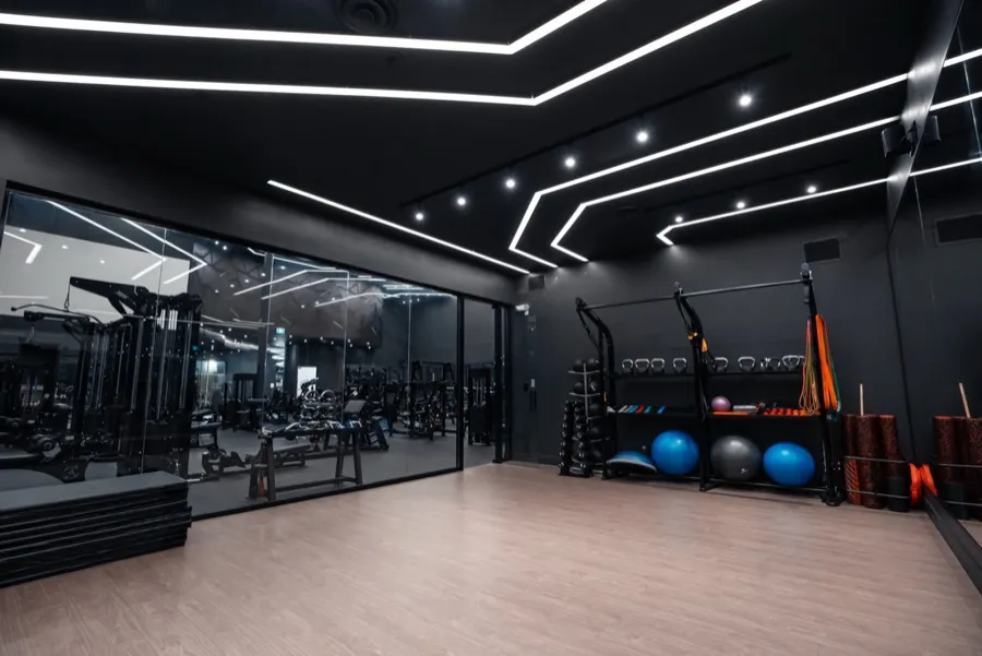 Multipurpose room with kettlebells, bands and mobility tools