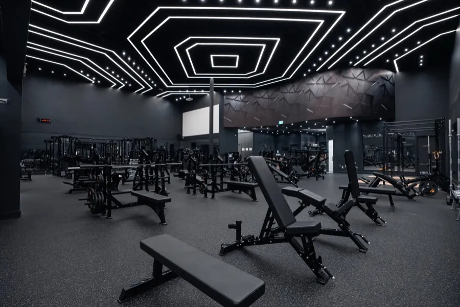 Rows of benches and racks on the strength floor